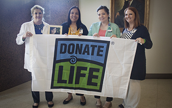 Donate Life flag raised at Hendrick Medical Center to honor organ donors
